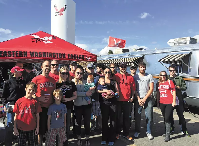 Scott and Andrea LaPlant host a big crew before a recent home game at Roos Field. - MAX CARTER