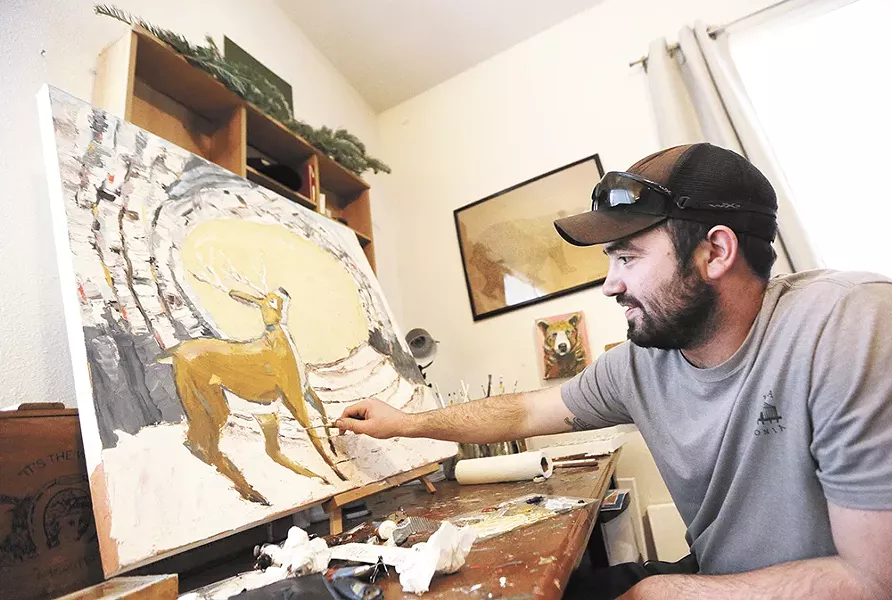 Jeff Weir at work in his home studio in Post Falls. - YOUNG KWAK