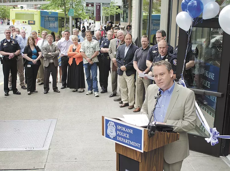 Mayor Condon at the 2013 ribbon-cutting, officially opening SPD's downtown precinct. - JACOB JONES