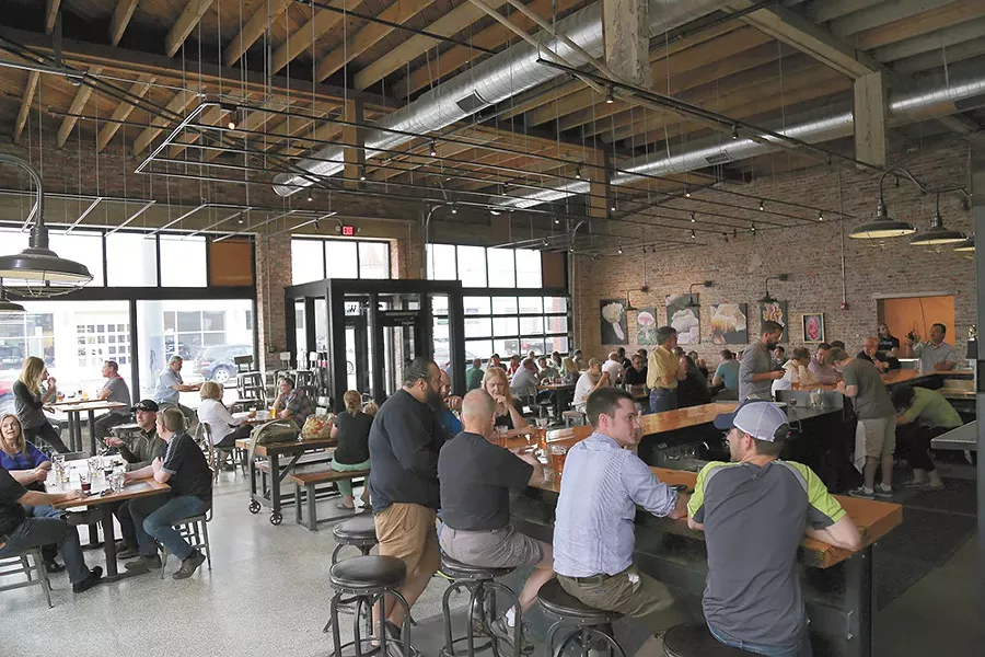 Iron Goat Brewing Co.'s new brewery and restaurant on the west side of downtown has been an instant hit since opening in mid April. - SARAH PHILP