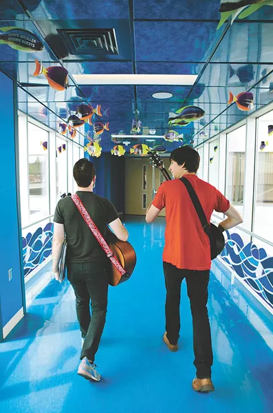 Strolling to the next stop to spread some cheer at Sacred Heart. - KRISTEN BLACK