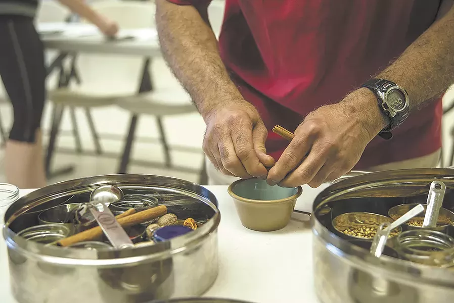 Max Manjit Mohan teaches Indian cooking in Moscow, hoping to "demystify" the cuisine. - TARYN PHANEUF