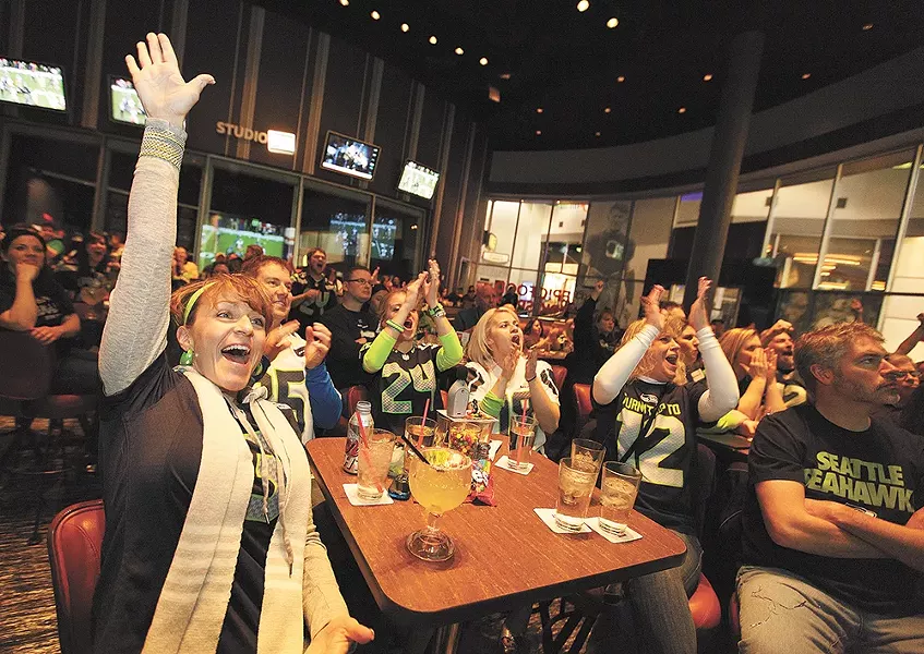 Seahawks fans celebrate the 2014 NFC Championship. - YOUNG KWAK
