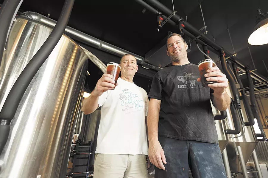 Head brewer Zach Shaw, left, and owner Chris Bennett sample their work at Bennidito’s Brewpub. - YOUNG KWAK