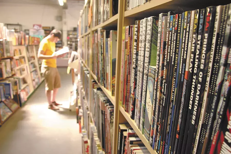 Graphic novels, sci-fi and games line the shelves at Merlyn’s.