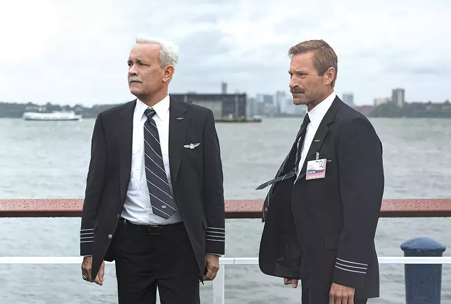 Tom Hanks (left) plays famed airline captain Chesley "Sully" Sullenberger. Aaron Eckhart (right) plays his co-pilot.