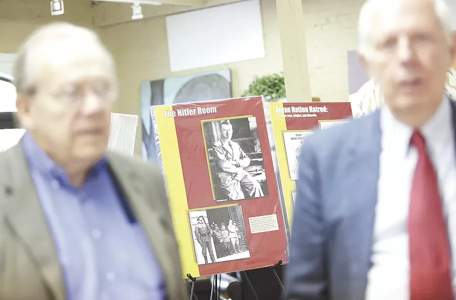 Items taken from the since-destroyed Aryan Nations included Hitler photos and other Nazi iconography. - YOUNG KWAK
