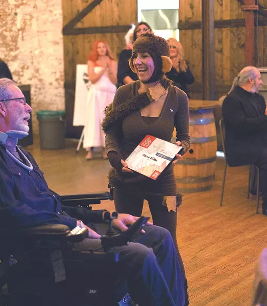 Steve Gibbs receives the Karen Mobley Arts Impact Award from Ellen Picken. - HECTOR AIZON
