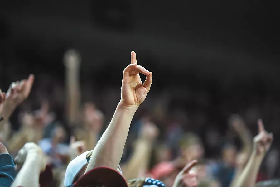 A fan marks the Zags' seed in the Kennel last month. - RAJAH BOSE