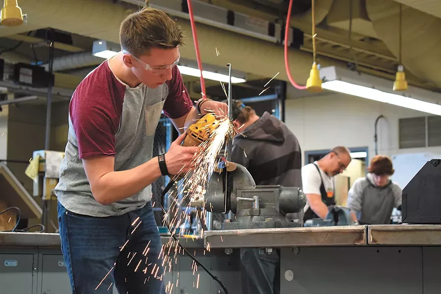 Many students, like Ben Meredith, prefer working with their hands. - WILSON CRISCIONE