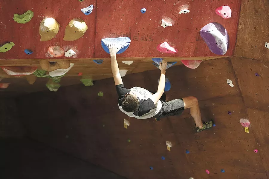 Rock climbing is skyrocketing in popularity, and bouldering-style climbing is a great way to build strength for outdoor climbs, Bloc Yard manager Brett Jessen says. - YOUNG KWAK