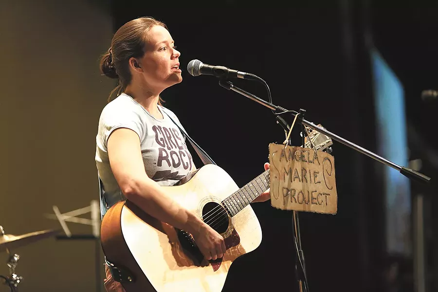 Liz Rognes moderates a discussion on the literary merit of lyrics on Friday. - YOUNG KWAK