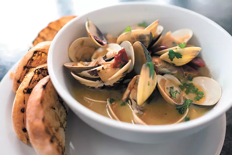 Steamed clams are just one of Craft & Gather's varied pub fare offerings. - HECTOR AIZON