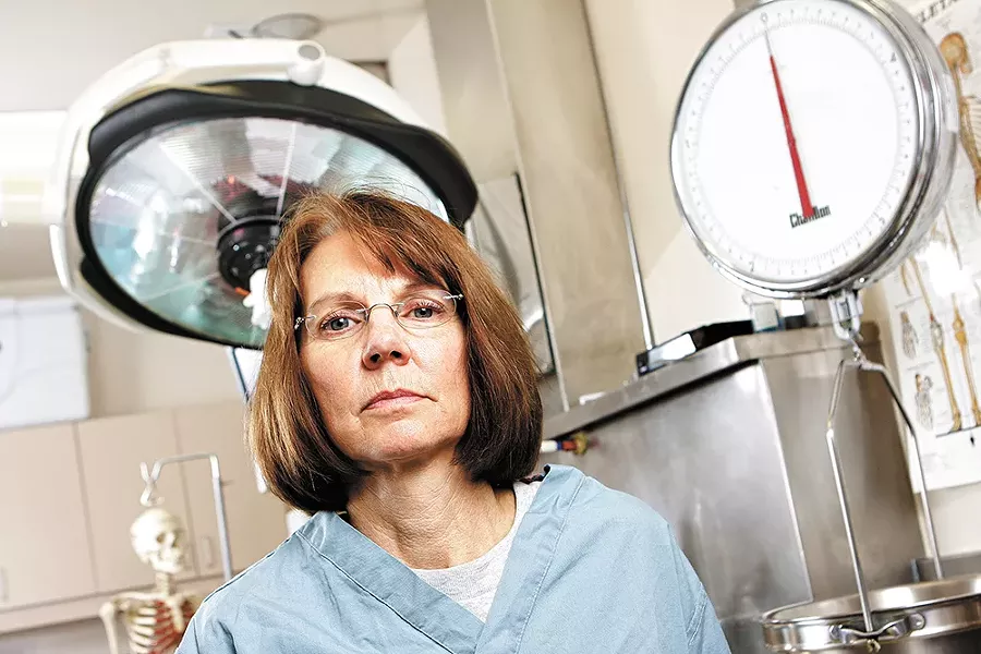 Dr. Sally Aiken, one of Spokane's two medical examiners, emphasizes the importance of remaining neutral: "Our responsibility is to the truth." - YOUNG KWAK