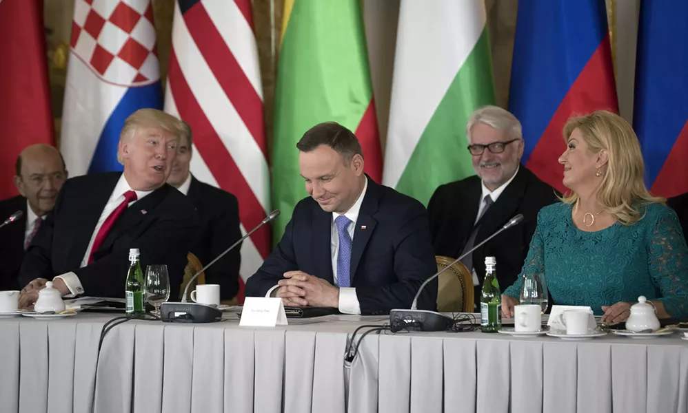 From left: President Donald Trump, Poland's President Andrzej Duda and Croatia's President Kolinda Grabar-Kitarović during a summit of the Three Seas Initiative, at the Royal Castle in Warsaw, Poland, July 6, 2017. Trump, delivering a stark message to a friendly Polish crowd before a two-day G-20 summit, cast the West’s battle against “radical Islamic terrorism” as a way to protect “our civilization and our way of life.” - STEPHEN CROWLEY/THE NEW YORK TIMES