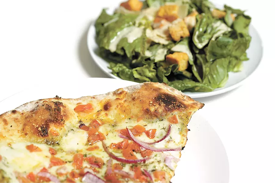 Grab a quick slice and salad at Veraci in Kendall Yards. - YOUNG KWAK