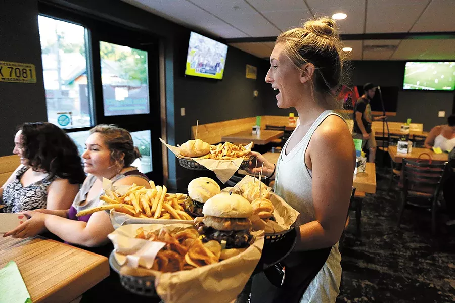 Brooke Whitsell brings out an order at Wisconsinburger. - YOUNG KWAK