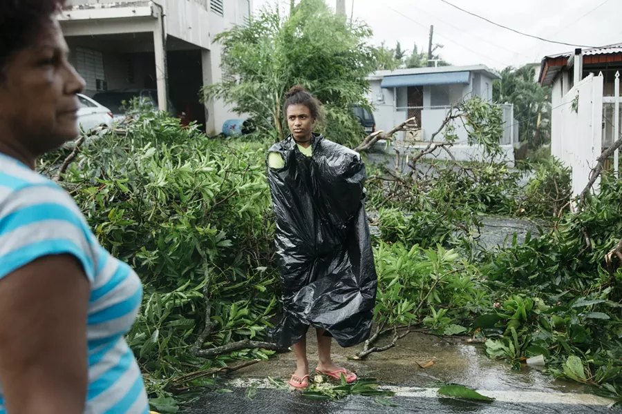 Keydeliz Nieves, 15, right, with her grandmother, Maria Nieves, views the aftermath of Hurricane Maria in Guaynabo, P.R., Sept. 20, 2017. Hurricane Maria battered Puerto Rico as a Category 4 storm on Wednesday, sending thousands of people scrambling to shelters and knocking out power on the island. - ERIKA P. RODRIGUEZ/THE NEW YORK TIMES