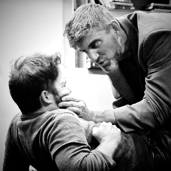 Robert Thompson (left) as Khaled and Patrick McHenry-Kroetch as Carl.