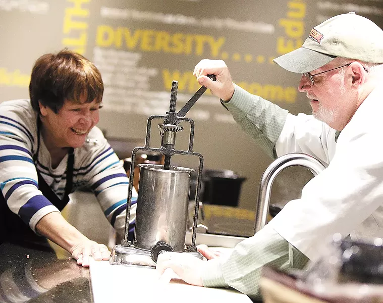 Hodge teaches how to make a breakfast sausage during a recent beginner's class hosted by Second Harvest Food Bank. - YOUNG KWAK