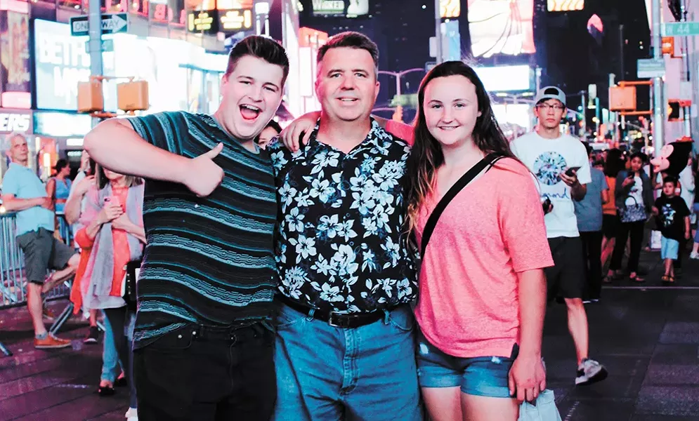 Sam Strahan (left), his dad Scott and sister Emily - STRAHAN FAMILY PHOTO