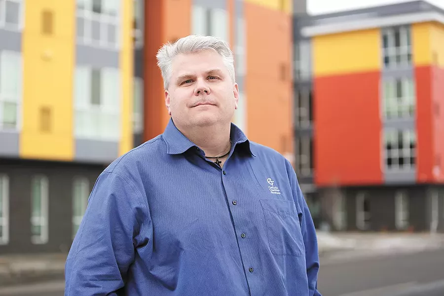 Catholic Charities’ Rob McCann is leading efforts to end homelessness in the region. - YOUNG KWAK