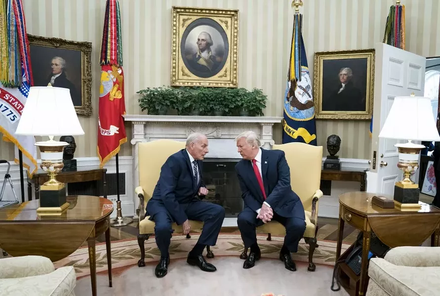 John Kelly, the White House chief of staff, with President Donald Trump in the Oval Office of the White House in Washington, July, 31, 2017. Trump directly contradicted Kelly on Jan. 18, 2017, and said his position on building a wall between the United States and Mexico had not “evolved.” - DOUG MILLS/THE NEW YORK TIMES