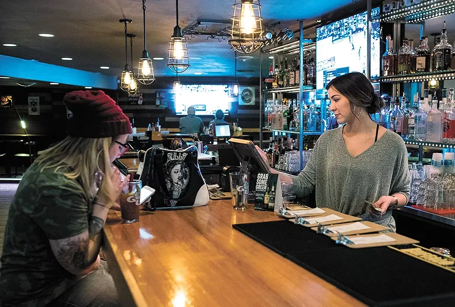 Logan Tavern carries on a neighborhood legacy. - HECTOR AIZON