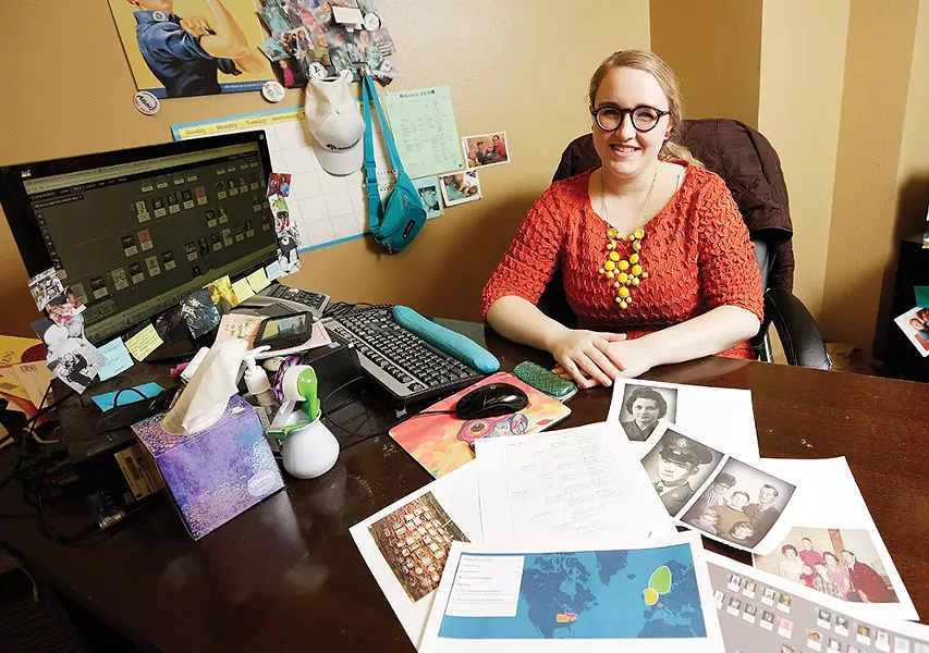 Kelsi-Lyn Smith displays photos and some of her vast collection of information on her own family history. - YOUNG KWAK