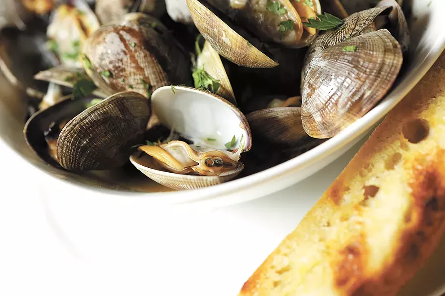 Park Lodge's menu features many familiar dishes, like steamed Manila clams. - YOUNG KWAK
