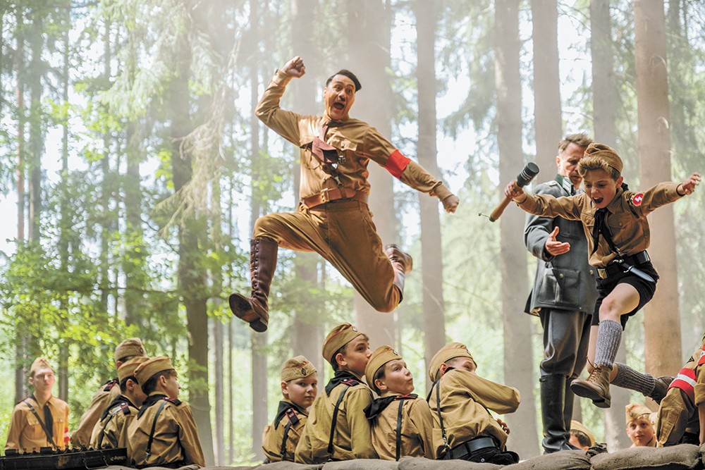 In the dark comedy Jojo Rabbit, a little boy and his pretend pal — who  happens to be Hitler — grapple with the horrors of WWII | Movie Reviews |  Spokane |