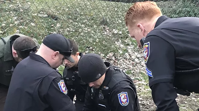 A photo, taken by witness Eddie Westerman, shows a police officer's knee on a suspect's neck.