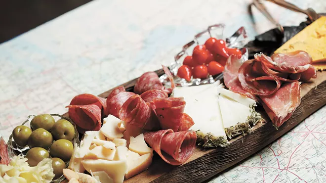 A cheese and charcuterie board at Wanderlust Delicato.