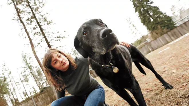 Claire Miller and 13-year-old Labrador Dewey were both zapped by an electrified metal vault cover in downtown Spokane.