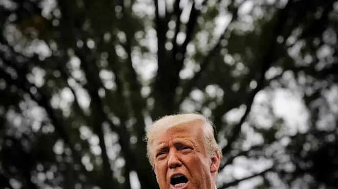 President Donald Trump talks reporters on the South Lawn of the White House in Washington, Sept. 24, 2020.