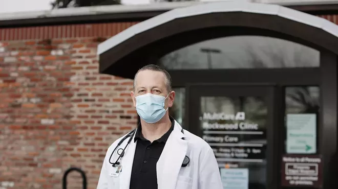 Dr. Jonathan Staben, pictured outside his clinic in Cheney, is the principal investigator leading a Phase 3 clinical trial of a new COVID-19 vaccine developed by Novavax.