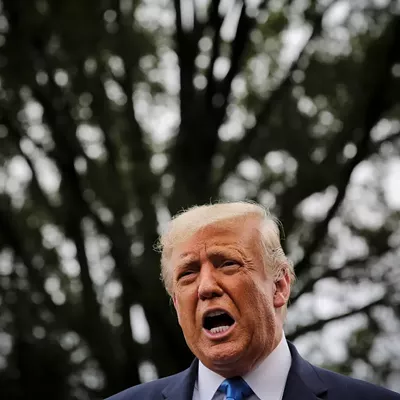 President Donald Trump talks reporters on the South Lawn of the White House in Washington, Sept. 24, 2020.