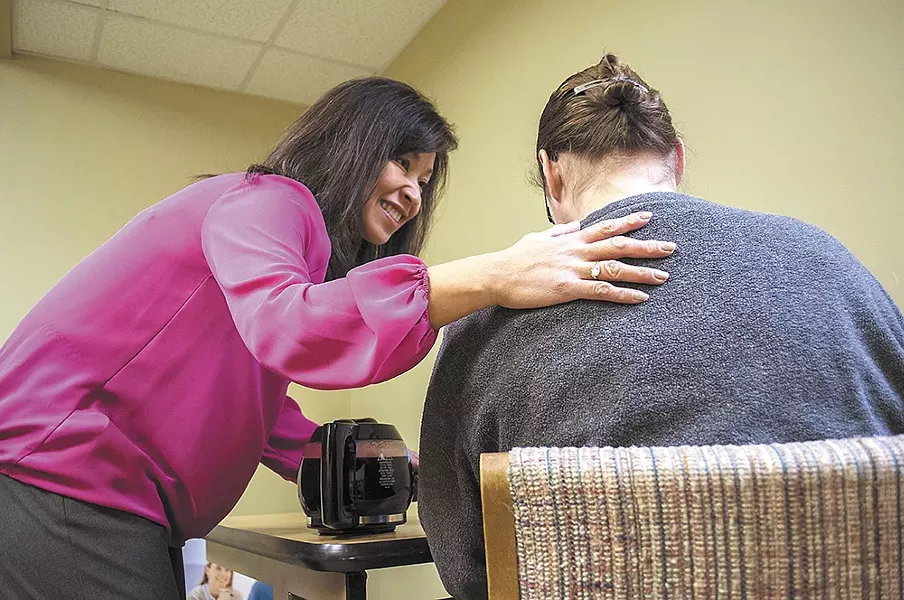 While making house calls, Tiffany Murphy, RN, helps patients safely combine home remedies and medication. - SARAH WURTZ