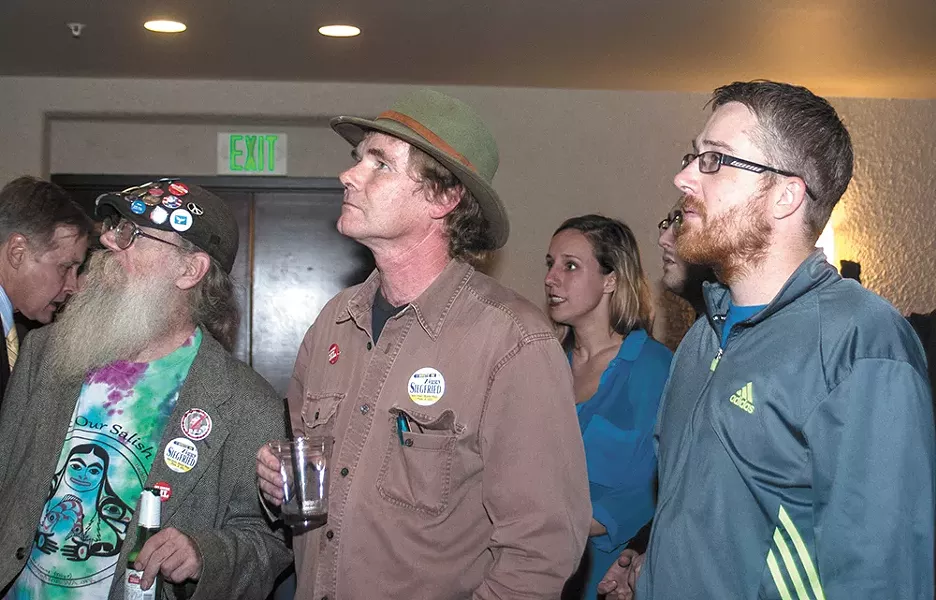 Ziggy Siegfried, a candidate for 6th District state representative, watches returns at an election party for local Democrats. - ASHLEY TOMLINSON