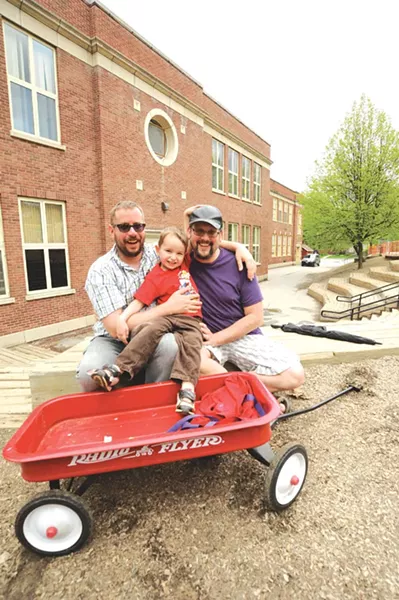 Chris Ilstrup, left, and Christopher Kaufman Ilstrup with their son, Jacob