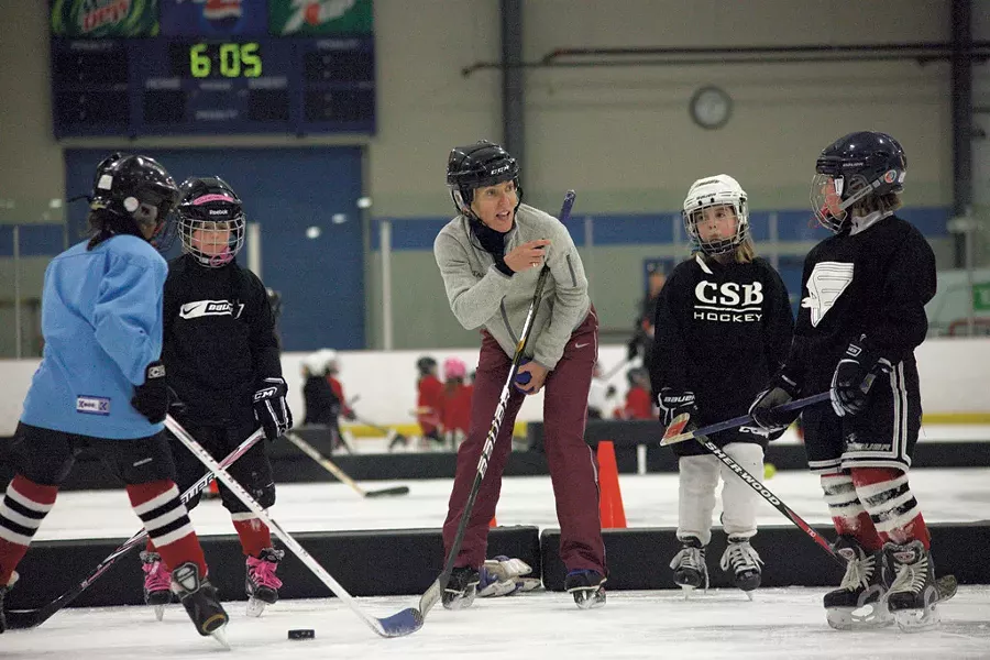 CSB U8 coach Laurie Brown instructs her players during practice - MATTHEW THORSEN
