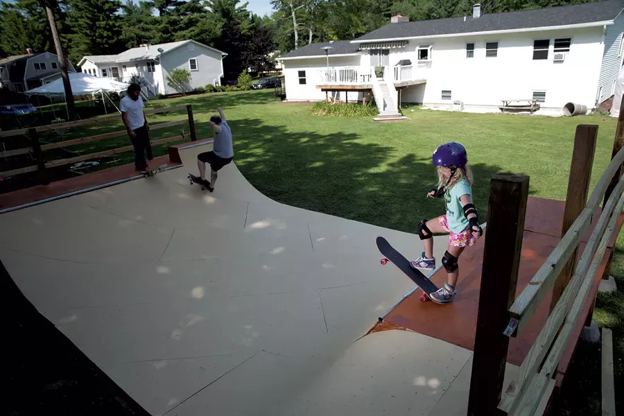 Fiona and her dad, Nate Beaman, navigate the ramp while Adam Lukens look on.matthew thorsen