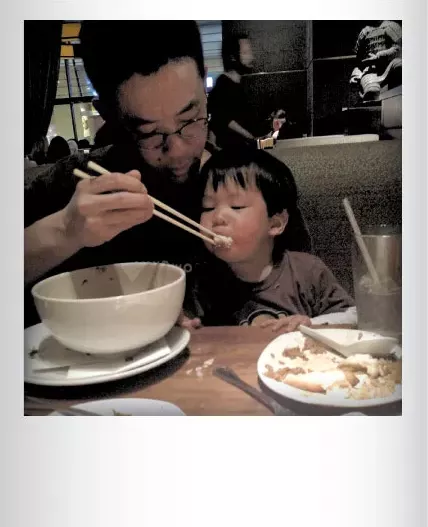 Mitchell and Parker Tsai eating Chinese food in Providence, R.I. in April. Submitted by Sheramy Tsai, South Burlington