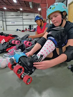 Elah Spence and Ingrid Gilliam lace up for practice - MATTHEW THORSEN
