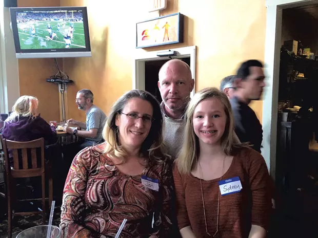 Sydney Hicks with her parents