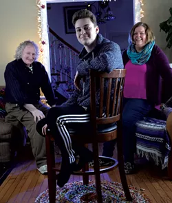 Marcus at home with his parents, Chuck and Penny - MATTHEW THORSEN