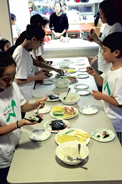 Students making kimbap - MATTHEW THORSEN