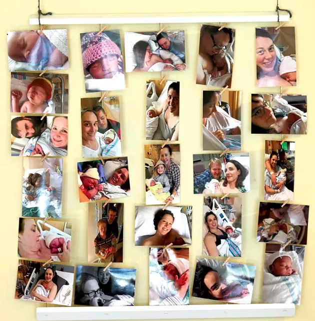 A wall of birth photos in Evolution's lobby - MATTHEW THORSEN