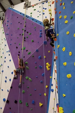 Rock wall climbers - COURTESY OF METROROCK