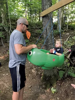 Dan Huskes and son Jayce stop by for a swing - BRETT STANCIU